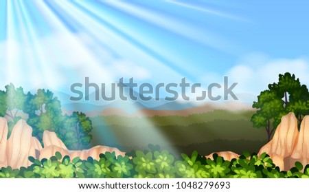 Mountainous scene with sun rays coming through the sky