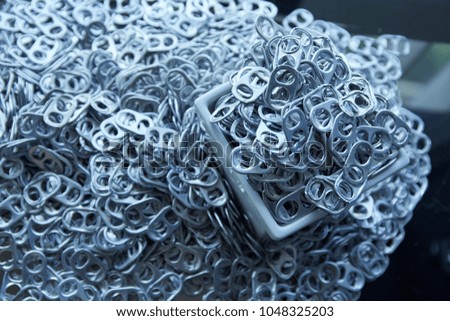 Ring pull aluminum of cans, use for made the artificial legs.