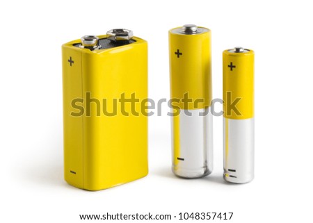 Three batteries (AAA, AA and PP3), isolated on white background Royalty-Free Stock Photo #1048357417