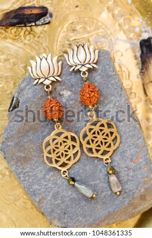 Beautiful lotus and seed of life design earrings