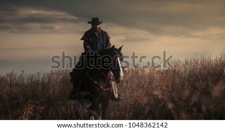 western cowboy portrait Royalty-Free Stock Photo #1048362142