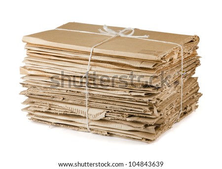 Waste cardboard bundle for recycling isolated on white Royalty-Free Stock Photo #104843639