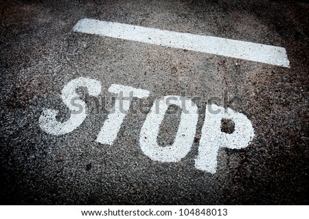 Stop sign painted on the wall