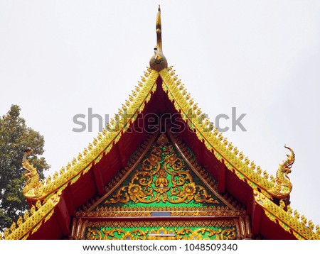 Traditional Temple Roofing with Golden King Serpents