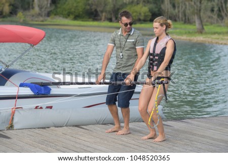 young woman on water skiing class