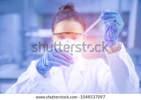 Young female scientist working in the CDC laboratory