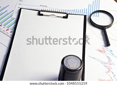 
Print on a blank sheet, magnifying glass and graphics