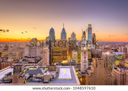 Philadelphia, Pennsylvania, USA skyline over the Center City business district at dusk.