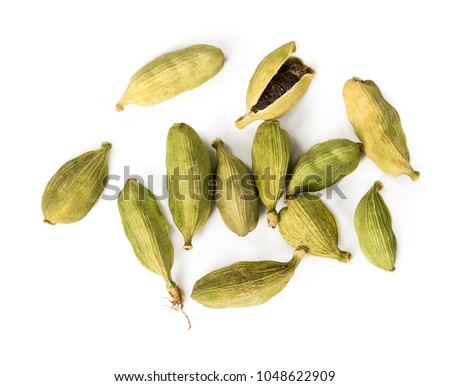 Cardamon pods isolated on white background. Top view. Royalty-Free Stock Photo #1048622909