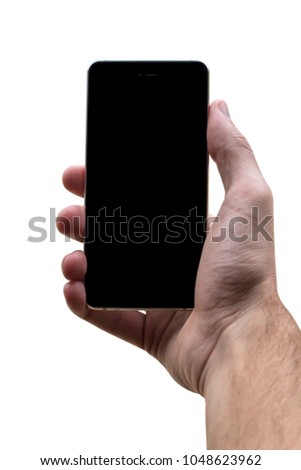 Male hand holding black cellphone with black screen at isolated white background.