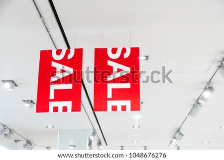 sale banner hanging in store,successful business marketing with cheap and saving money.