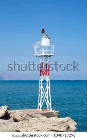 Safe guard tower on the peer.  Holidays concept image. Greece