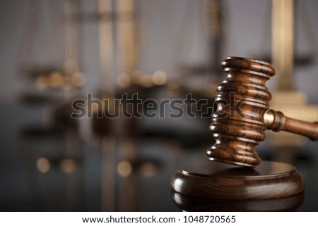 Law symbols on gray background.