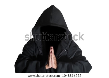 Hooded man in shadow on white background.