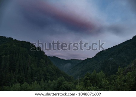 Landscape on the peak in Carpathian mountains at night.
