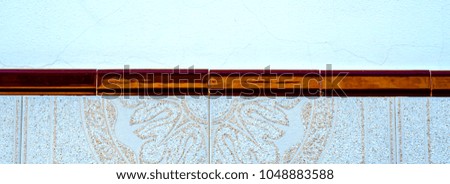 Traditional ornamental Spanish decorative tiles, original ceramic tiles on the walls of buildings, decoration