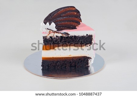 Delicious slice cake on white background. Tasty Festive dessert