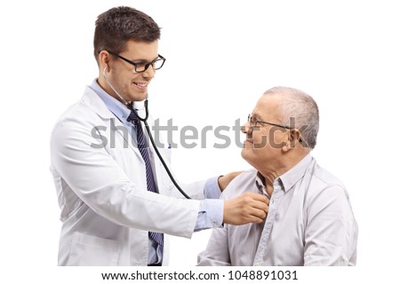 Doctor examining an elderly patient with a stethoscope isolated on white background Royalty-Free Stock Photo #1048891031