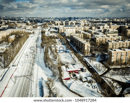 aerial shot of a railways in a city on a winter sunny day in the city