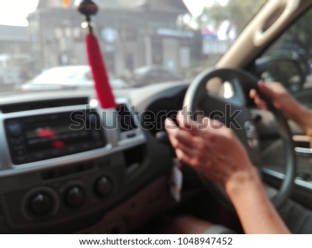 Blurry image,Road driving in urban society, the symbol of travel, safety in life and property.need blur picture