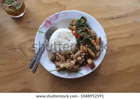 Picture for THAI street food catalogs menu , Rice topped with stir-fried minced pork and basil with Garlic Pepper Pork 