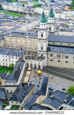 Salzburg city skyline from high point of view in Salzburg Fort and Castle rooftops and historic buildings vertical composition