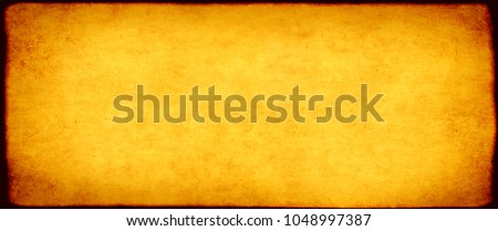 Grunge background with texture of old soiled paper of yellow color