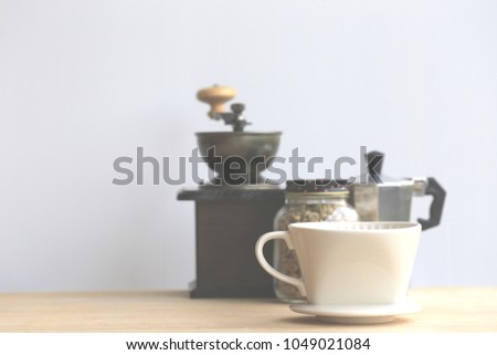Retro coffee maker on the floor selective focus and shallow depth of field