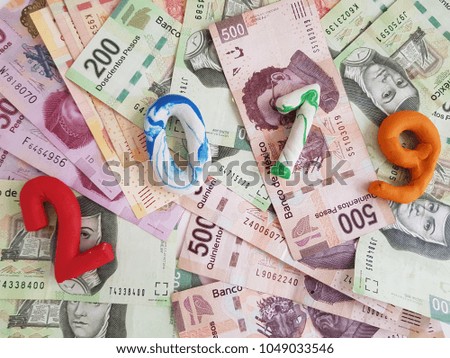 number 2019 with colors in 3d, on Mexican banknotes, textured background