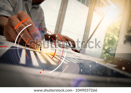 Businessman working with new modern computer and Bitcoin cryptocurry virtual diagram as concept.