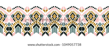 Ikat geometric folklore ornament. Tribal ethnic vector texture. Seamless striped  pattern in Aztec style. Figure tribal  embroidery. Indian, Scandinavian, Gypsy, Mexican, folk pattern.  Royalty-Free Stock Photo #1049057738