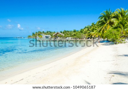 Belize Cayes - Small tropical island at Barrier Reef with paradise beach - known for diving, snorkeling and relaxing vacations - Caribbean Sea, Belize, Central America Royalty-Free Stock Photo #1049065187