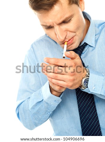 Portrait of handsome businessman with cigarette on white