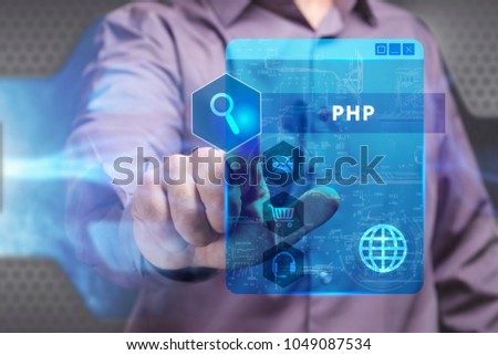 Business, Technology, Internet and network concept. Young businessman working on a virtual screen of the future and sees the inscription: PHP