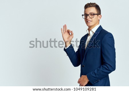  business man showing thumbs up signs                              