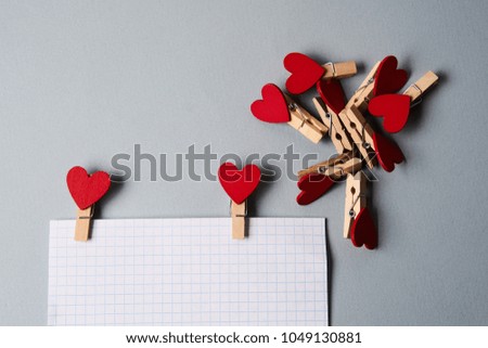 clothespins with hearts, objects, free place                               