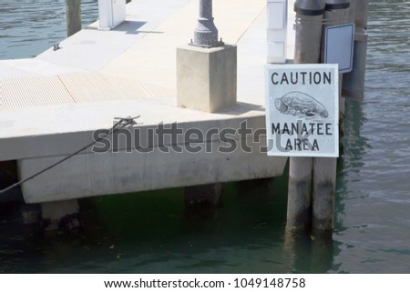 Manatee warning sign in Miami harbor