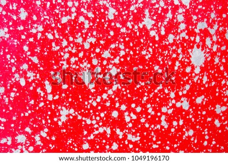 Art concrete splash on red concrete wall texture background