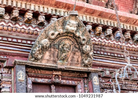 Wood craft of goddes in hinduism sculpted on archway that according to belief of Nepali people for guarding the door and preventing evil enter temple.
