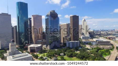 Panorama aerial view Houston downtown and Gulf Freeway (highway I45). Daytime cityscape with cloud blue sky.