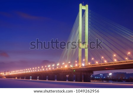 Night view of the city and the bridge in the lights