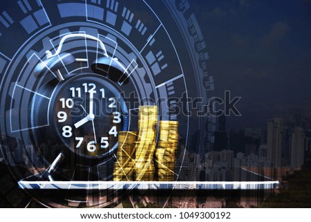 Double exposure of coins stacks and alarm clock with tablet on city background and financial graph, business planning vision and finance analysis concept idea.
