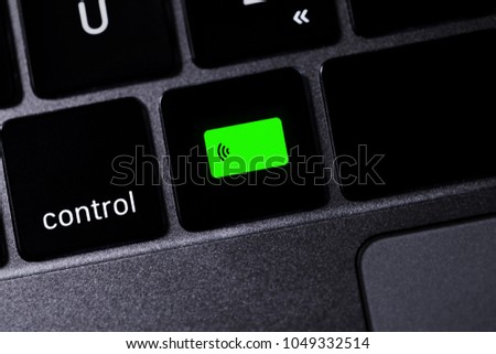 computer keyboard with business icons
