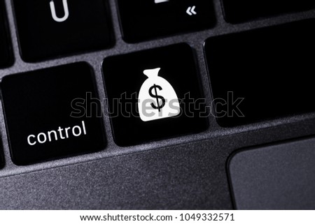 computer keyboard with business icons