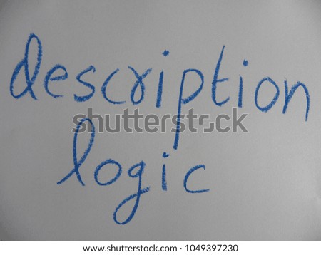 Text description logic hand written by blue oil pastel on white color paper