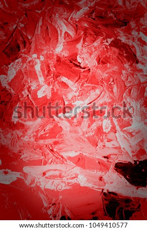 Wild fire and lava in darkness abstract art background. Oil painting on linen canvas. Black and red tones texture. Dimmed picture fragment. Brushstrokes of paint
