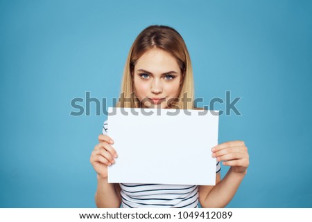woman holding a sheet of paper,  place to copy 