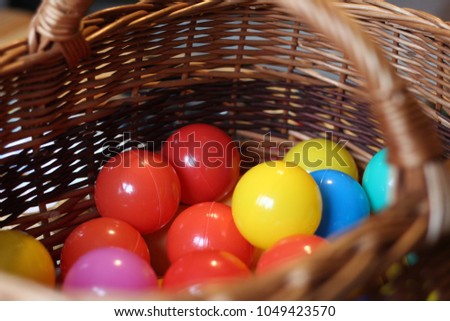plastic ball in a basket