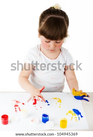 Portrait of a cute cheerful girl with painted hands, isolated over white. euro 2012