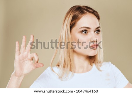  woman showing thumbs up signs                              